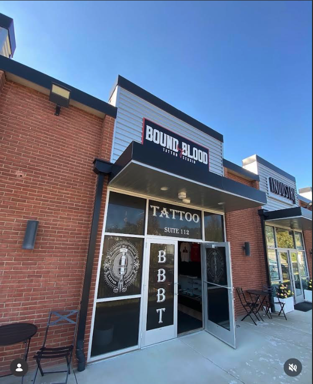 Bound by Blood storefront and entrance at Suite 112